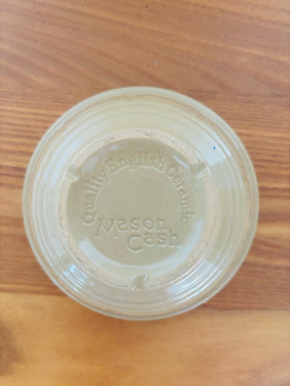 Mason Cash Ceramic Bowl in Light Beige with Blue Interior.